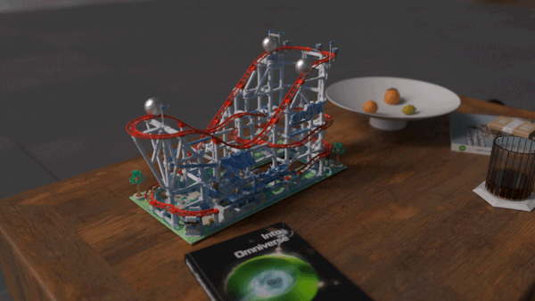 GIF of a marble rolling track.