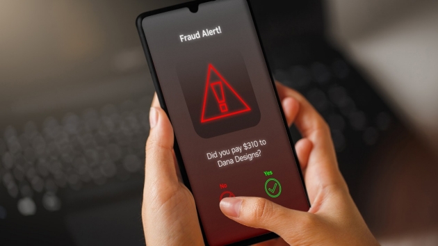 An image of a fraud detection alert on a mobile phone